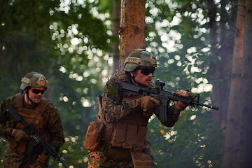 Image showing Modern warfare Soldiers  Squad  in battle