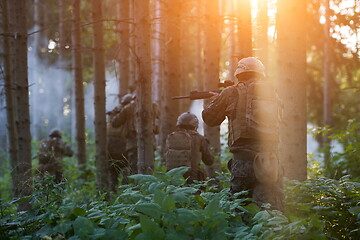 Image showing Modern warfare Soldiers  Squad  in battle