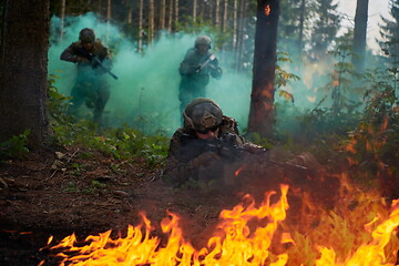 Image showing Modern warfare Soldiers  Squad  in battle