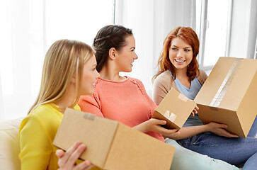 Image showing teenage girls or friends with parcel boxes
