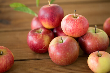 Image showing ripe red apples on wooden table