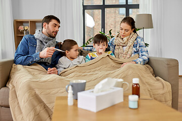 Image showing family with ill children having fever at home