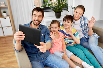 Image showing happy family having video call on tablet computer