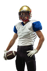 Image showing American football player in action isolated on white studio background