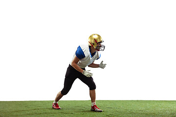 Image showing American football player in action isolated on white studio background