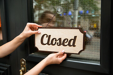 Image showing Closed sign on the glass of street cafe or restaurant