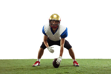 Image showing American football player in action isolated on white studio background