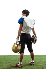 Image showing American football player in action isolated on white studio background