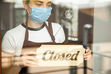 Image showing Closed sign on the glass of street cafe or restaurant