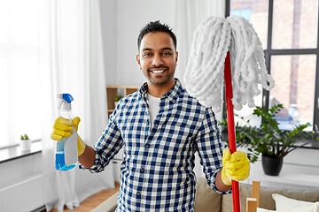 Image showing indian man with mop and detergent cleaning at home