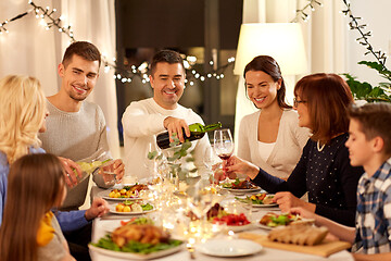 Image showing happy family having dinner party at home