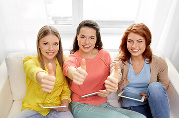 Image showing teenage girls with tablet pc showing thumbs up