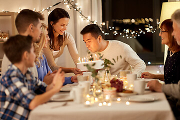 Image showing happy family having birthday party at home