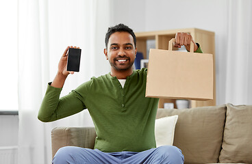 Image showing indian man using smartphone for food delivery