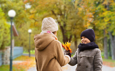 Image showing smiling children in autumn park