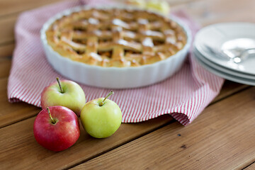 Image showing apples and pie on wooden table