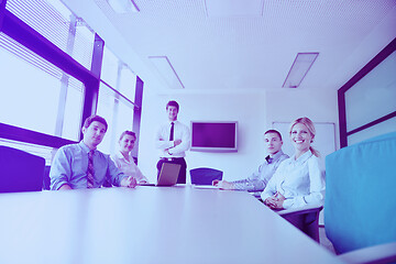 Image showing business people in a meeting at office