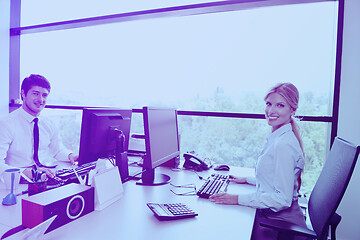 Image showing business people in a meeting at office