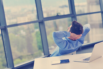 Image showing happy young business man at office