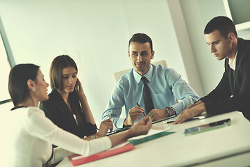 Image showing business people in a meeting at office