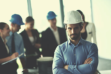 Image showing business people and engineers on meeting