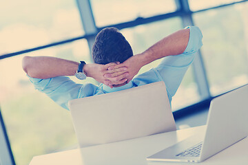 Image showing happy young business man at office