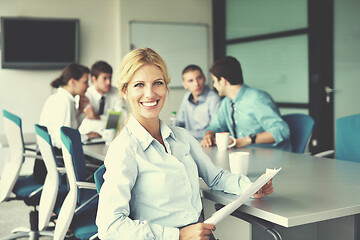 Image showing business people in a meeting at office