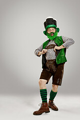 Image showing A man in a leprechaun hat at studio. He celebrates St. Patrick\'s Day.