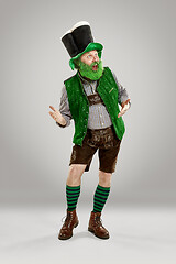 Image showing A man in a leprechaun hat at studio. He celebrates St. Patrick\'s Day.