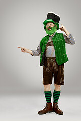 Image showing A man in a leprechaun hat at studio. He celebrates St. Patrick\'s Day.