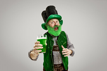 Image showing A man in a leprechaun hat at studio. He celebrates St. Patrick\'s Day.