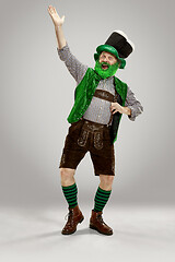 Image showing A man in a leprechaun hat at studio. He celebrates St. Patrick\'s Day.