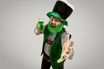 Image showing A man in a leprechaun hat at studio. He celebrates St. Patrick\'s Day.