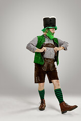 Image showing A man in a leprechaun hat at studio. He celebrates St. Patrick\'s Day.