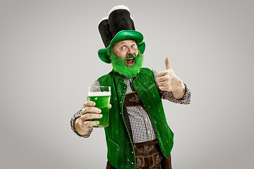 Image showing A man in a leprechaun hat at studio. He celebrates St. Patrick\'s Day.