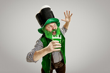 Image showing A man in a leprechaun hat at studio. He celebrates St. Patrick\'s Day.