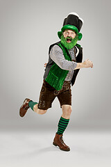 Image showing A man in a leprechaun hat at studio. He celebrates St. Patrick\'s Day.