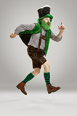 Image showing A man in a leprechaun hat at studio. He celebrates St. Patrick\'s Day.