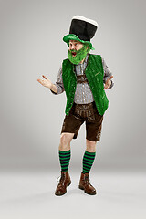 Image showing A man in a leprechaun hat at studio. He celebrates St. Patrick\'s Day.