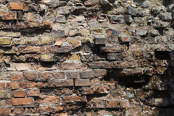 Image showing Part of the destroyed brick wall close-up