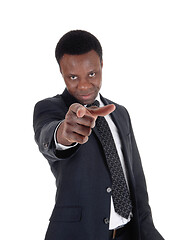 Image showing African business man pointing his finger