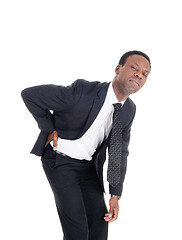 Image showing Man with back pain bending forward