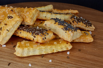 Image showing baked sticks with caraway, poppy, chia seeds, salt