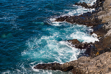 Image showing beautiful view on blue ocean water and rocky coast line