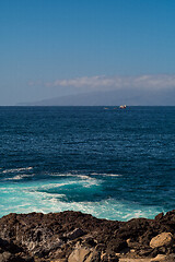 Image showing beautiful view on ocean water and black lava sand