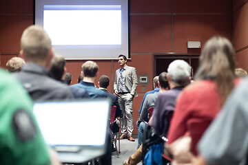 Image showing Business speaker giving a talk at business conference meeting event.