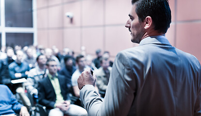 Image showing Public speaker giving talk at business event.