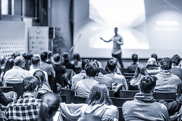 Image showing Male public peaker giving presentation on business conference event.