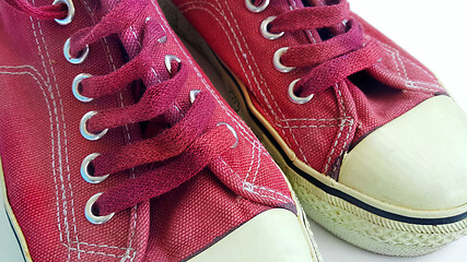 Image showing Close-up of wine-colored sneakers