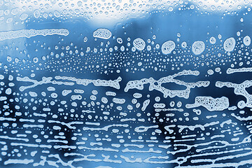 Image showing Soap foam pattern on glass